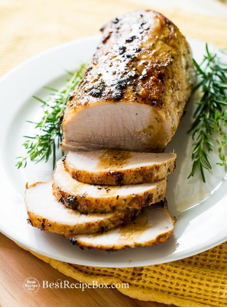 How long and at what temperature do you cook a pork loin in the oven?