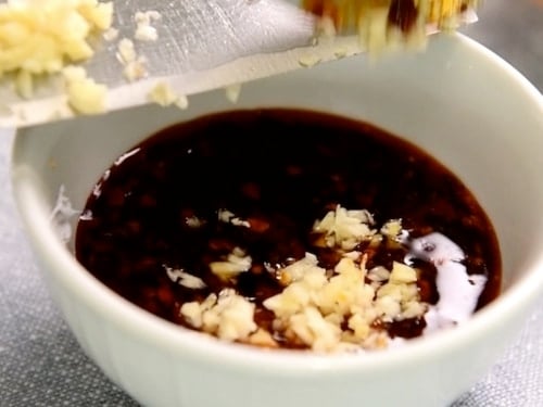 mixing dumpling sauce ingredients together