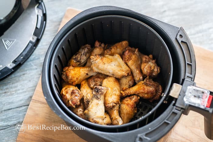cooked wings in air fryer basket
