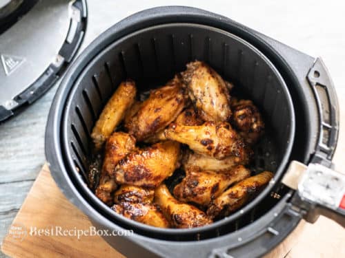 chicken wings cooked with sauce in basket