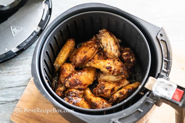 chicken wings cooked with sauce in basket