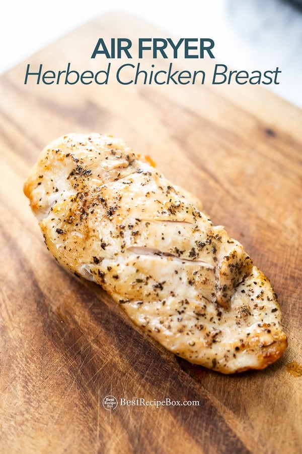 Air Fryer Herbed Chicken Breast Recipe on wood cutting board 