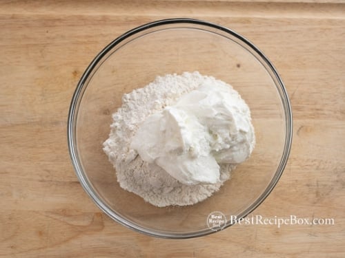 Yogurt and flour in bowl