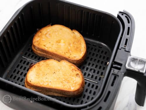 Grilled cheese sandwich in air fryer basket