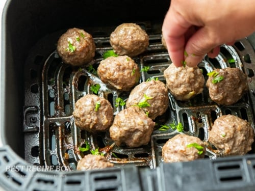 finished and cooked meatballs with garnish