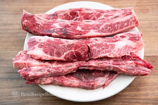 Uncooked short ribs on a plate