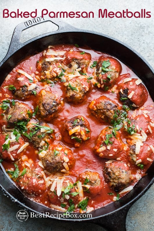 Baked Parmesan Meatballs Recipe for Easy Italian Meatball Dinner in a cast iron skillet