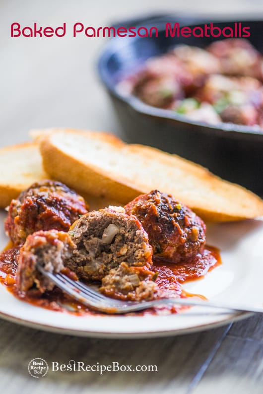 Baked Parmesan Meatballs Recipe for Easy Italian Meatball Dinner on a plate with fork