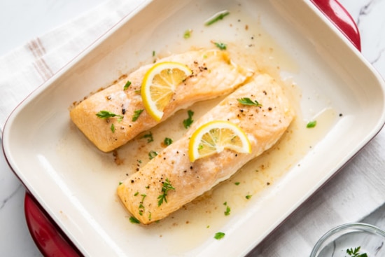 Salmon fillets garnished with lemon and parsley
