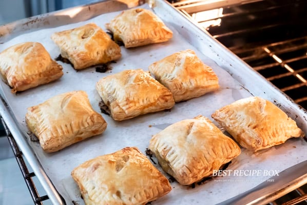 baked sausage cheese puff pastry on sheet pan
