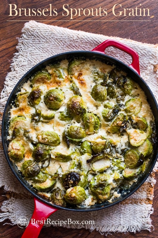 Cheesy Brussels Sprouts Gratin Casserole Recipe on cast iron skillet