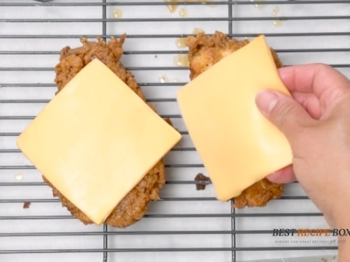 Adding cheese on chicken