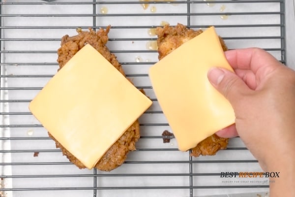 Adding cheese on chicken