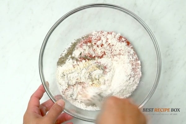 Mixing flour and spices
