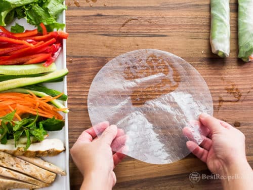 laying rice paper on rolling board