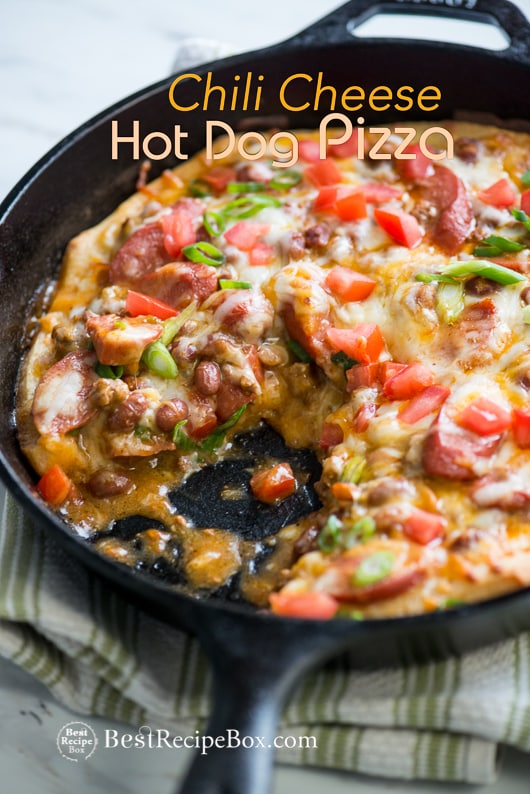 Chili Cheese Hot Dog Pizza Recipe in a cast iron skillet