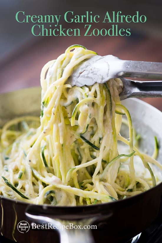 Creamy Garlic Zucchini Noodles in a cooking pan with tong