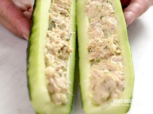 Filled cucumbers being placed together