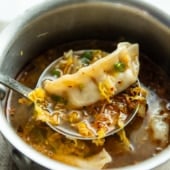 ladle with dumpling soup
