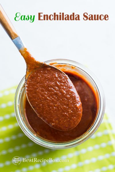 Easy Enchilada Sauce for great Mexican Recipes in a glass bowl with spoon