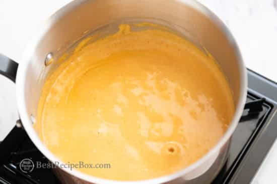 Melted queso dip in pan