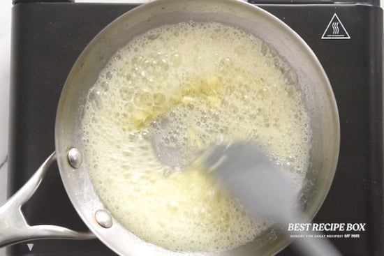 Butter and garlic cooking in a pan