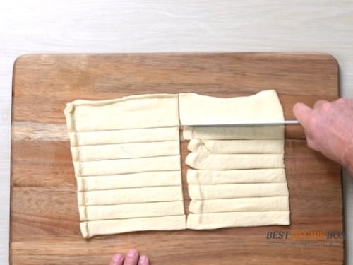 Cutting dough into strips