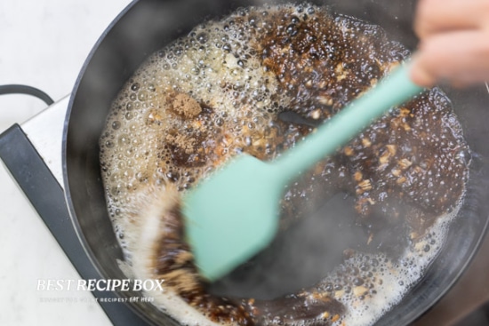 Stirring sauce in pan