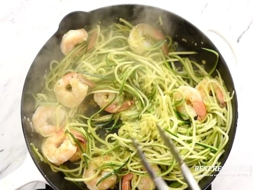 Stirring in zucchini noodles