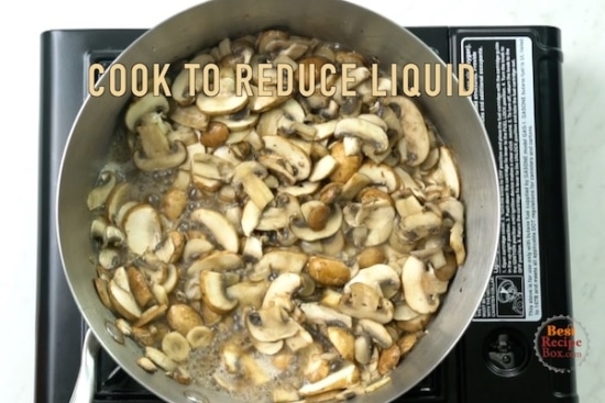 Cooking sliced mushrooms in skillet