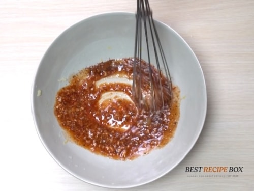 making vinaigrette for corn salad