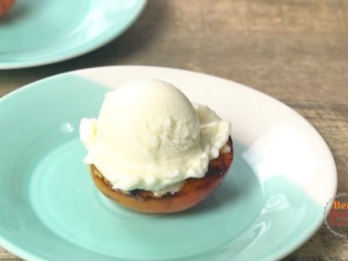 Ice cream on top of grilled peach