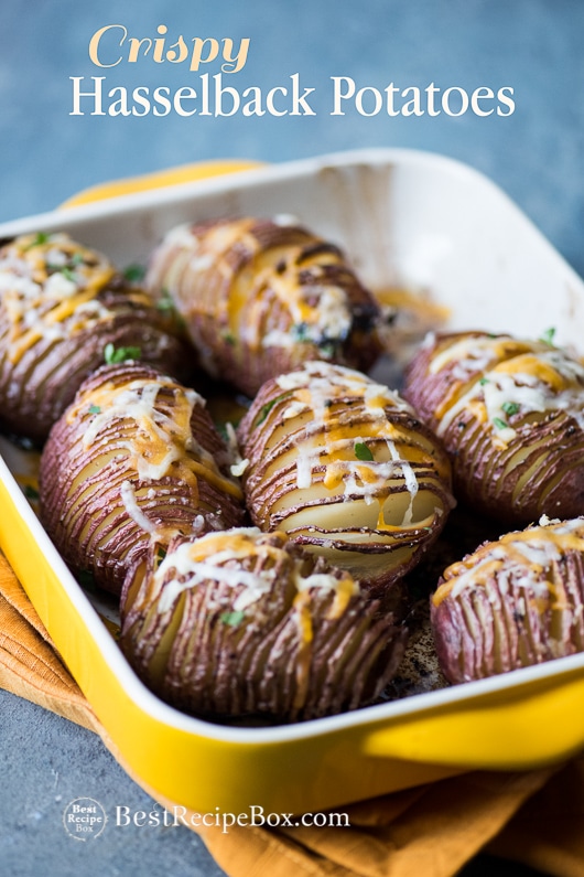 Crispy Hasselback Potatoes Recipe with Cheese Toppings in a casserole
