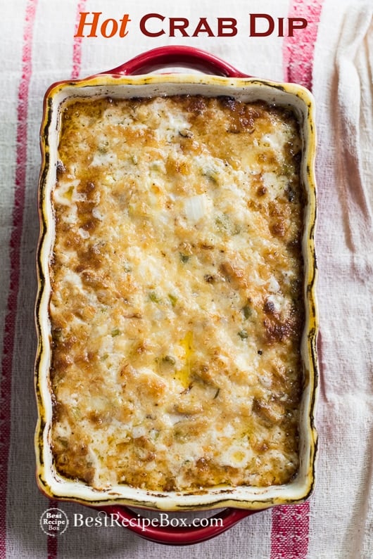 Hot Baked Crab Dip that's hot n' creamy , chunky n' delicious , addicting n' cheesy in casserole