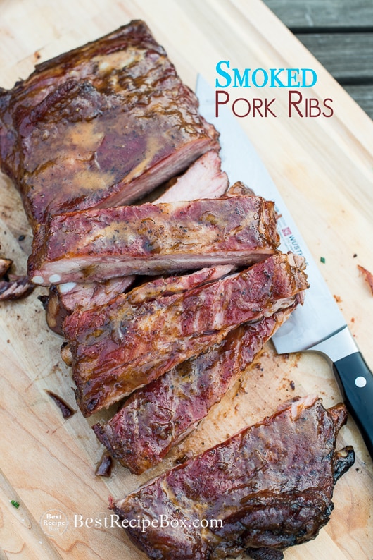 How to Smoke Pork Ribs Recipe on a cutting board with knife 