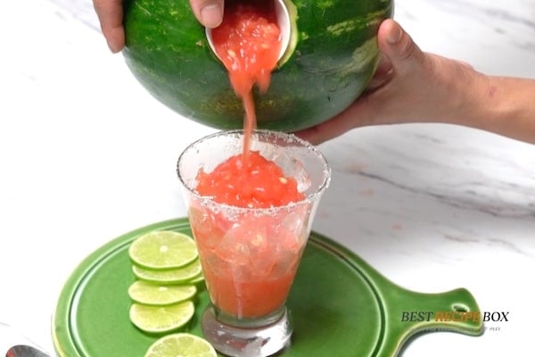 Pouring watermelon margarita