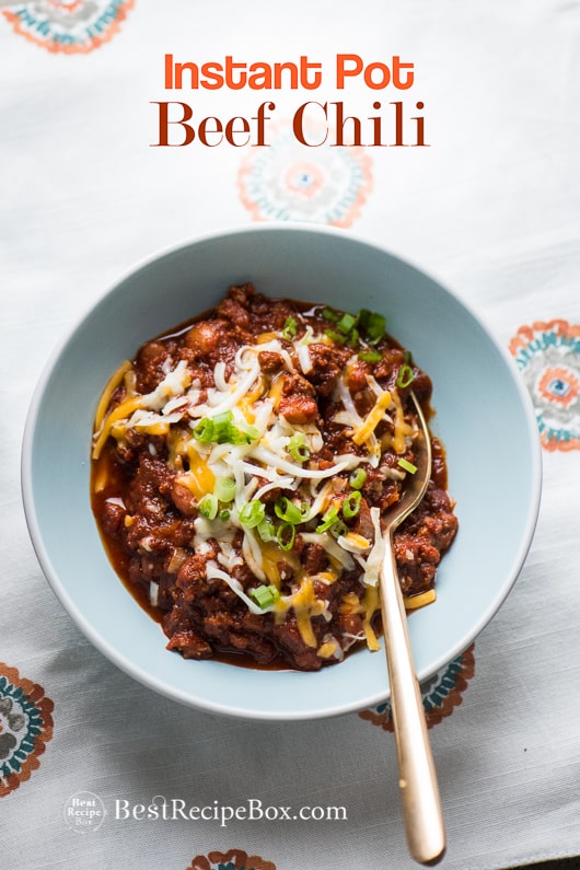 Instant Pot Beef Chili Recipe in Pressure Cooker or Slow Cooker in a bowl with spoon 