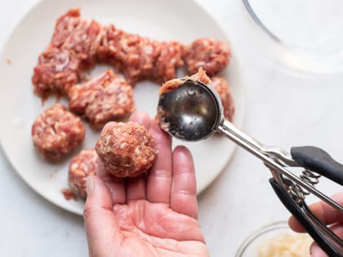 Using a cookie scoop to form meatballs