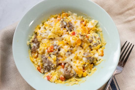 Cheese melted on top of sausage scramble