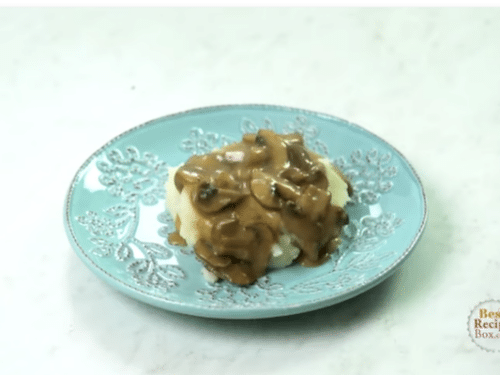 Spooned gravy over mashed potatoes