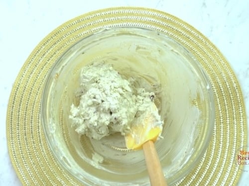 Cheese ball ingredients mixed in a bowl