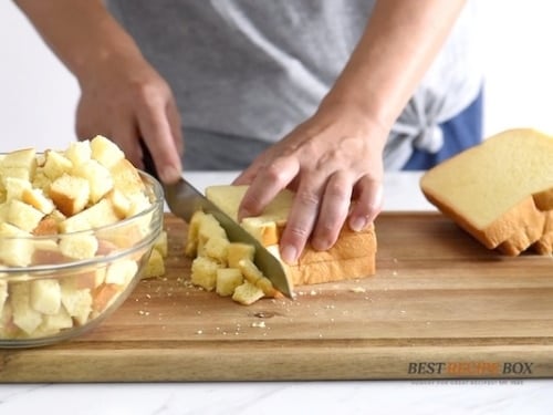 Cutting bread into cubes