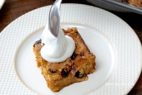 Dolloping whipped topping on bar