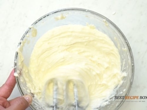 Mixing cream cheese filling