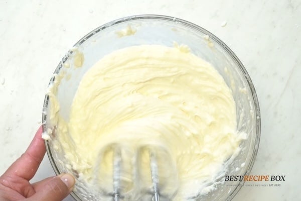 Mixing cream cheese filling