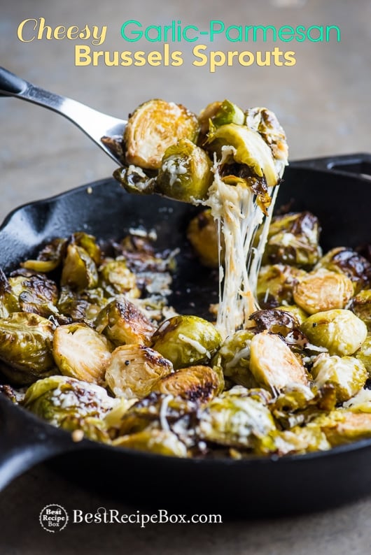 Cheesy Roasted Brussels Sprouts with Garlic and Parmesan in cast iron skillet