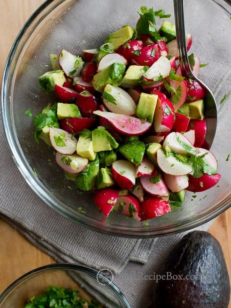 Healthy and Easy Radish Avocado Salad Recipe in a glass bowl