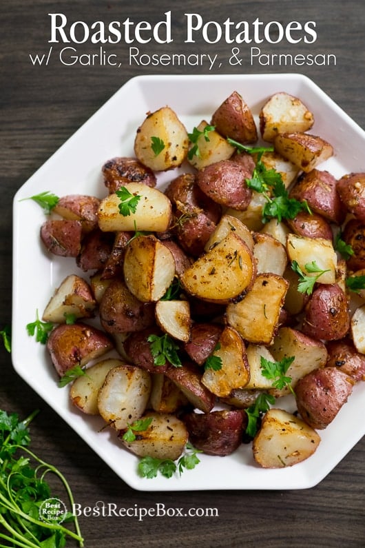 Easy Roasted Potatoes Recipe with Garlic, Rosemary, Parmesan Cheese on a plate