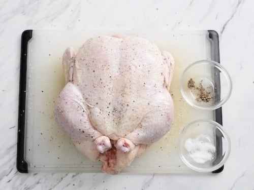 Seasoned raw whole chicken