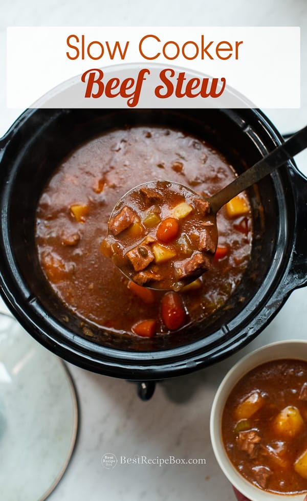 Slow Cooker Beef Stew Recipe in Crock Pot with ladle 